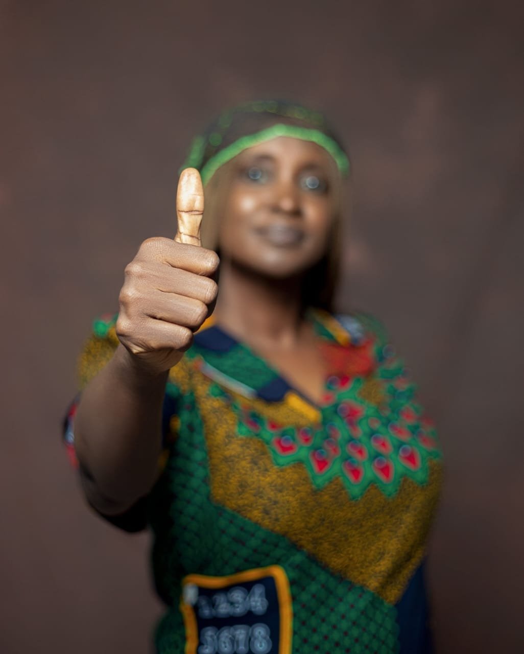 Maria Ude Nwachi giving a confident thumbs-up