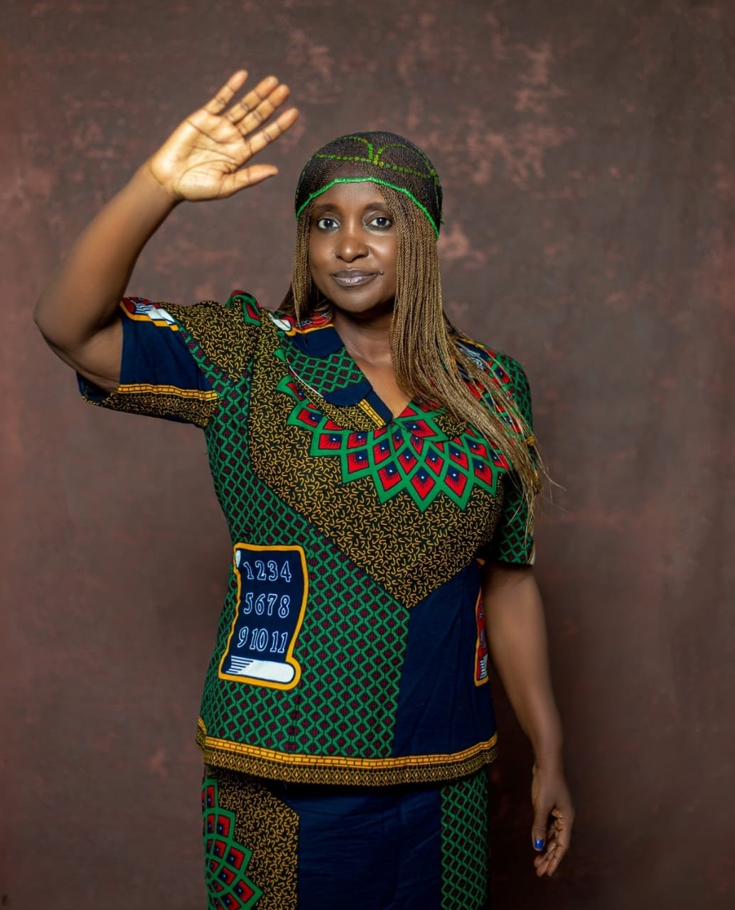 Maria Ude Nwachi greeting supporters